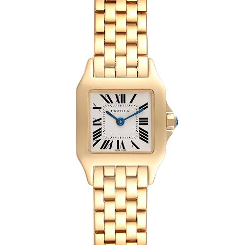 The image shows a front view of a Cartier Santos Demoiselle W25063X9 Women's Yellow Gold Silver Dial W25063X9 Women's Yellow Gold Silver Dial watch, showcasing its square dial, gold bracelet, and blue hands.