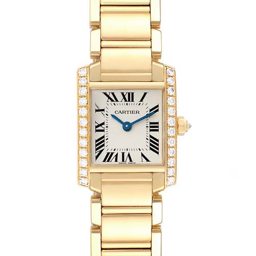 This image shows a frontal view of a gold Cartier Tank Francaise WE1001R8 Women's Yellow Gold Silver Dial WE1001R8 Women's Yellow Gold Silver Dial watch with a diamond bezel and Roman numeral dial.