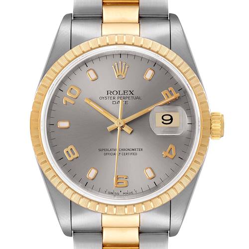 The image shows the front view of a Rolex Oyster Perpetual Date watch with a gold and stainless steel band.