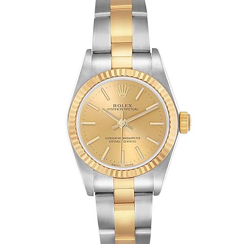 The Rolex Oyster Perpetual 76193 Women's Steel and Gold (two tone) Champagne Dial 76193 Women's Steel and Gold (two tone) Champagne Dial watch is shown from a top-down angle, highlighting the gold and silver bracelet and fluted bezel.