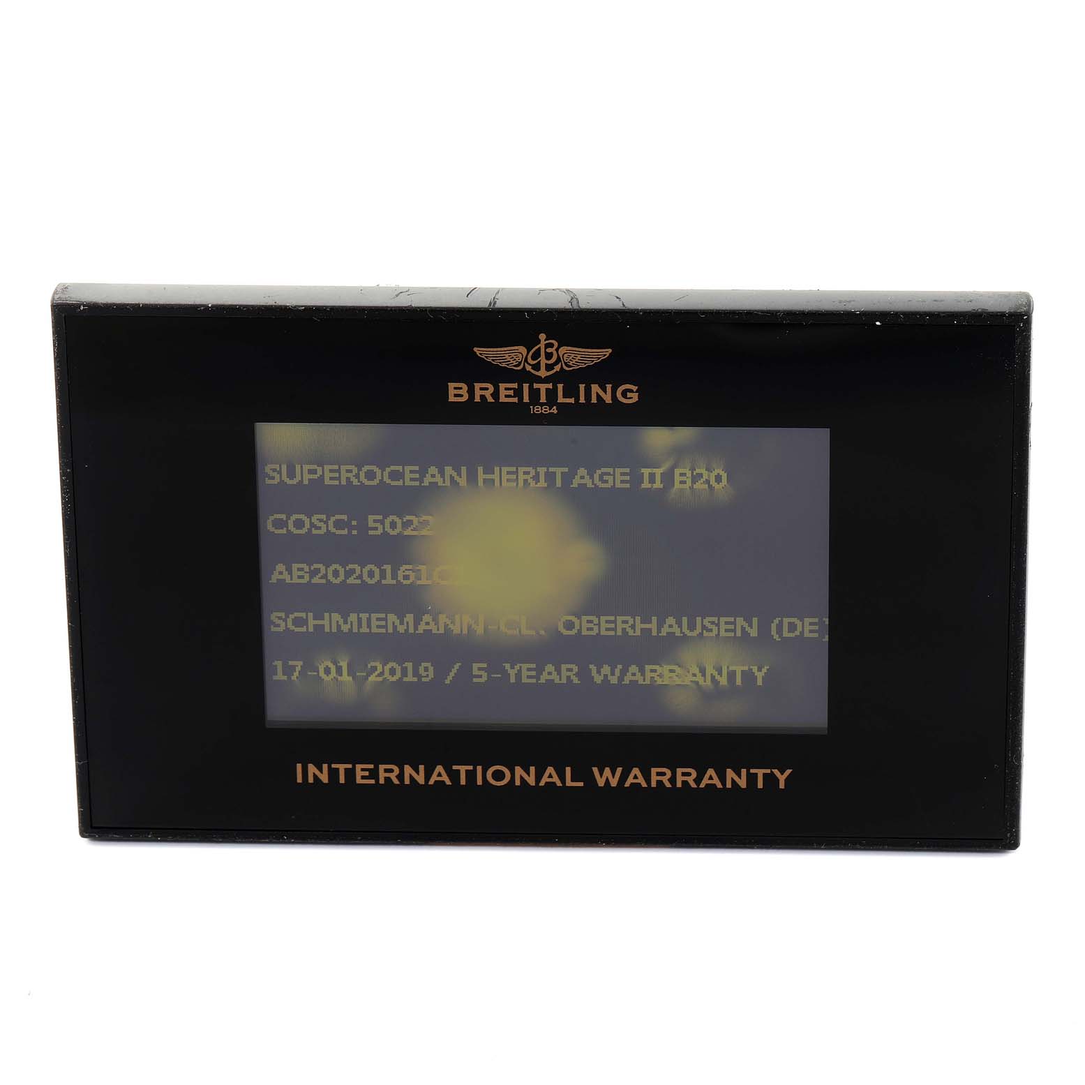 The image shows an International Warranty card for a Breitling Superocean AB202016-C961-152A Men's Stainless Steel Blue Dial AB202016-C961-152A Men's Stainless Steel Blue Dial Heritage II B20 watch, displayed frontally.