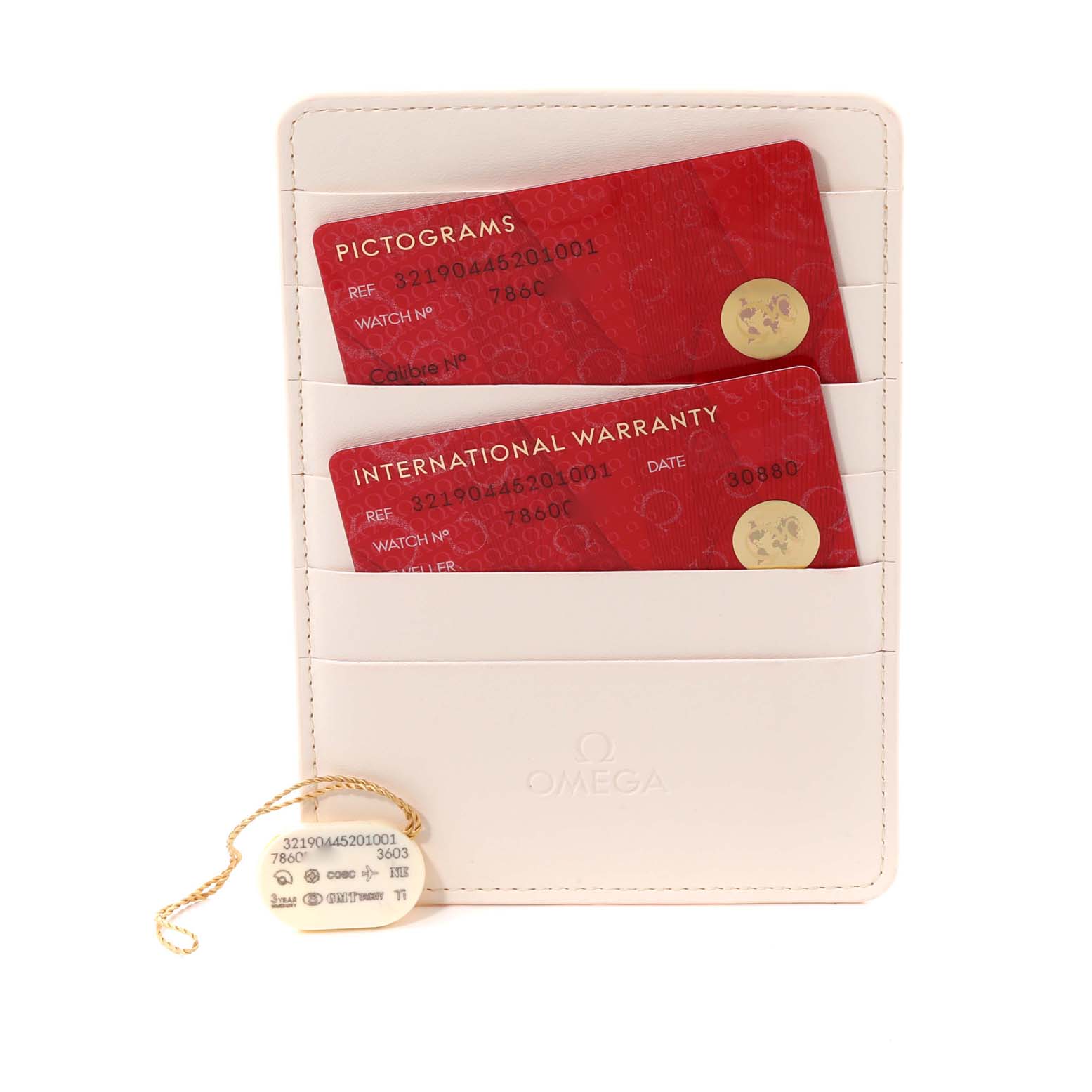 The image shows the warranty cards and a tag for an Omega Speedmaster 321.90.44.52.01.001 Men's Titanium Black Dial 321.90.44.52.01.001 Men's Titanium Black Dial watch placed in a white cardholder.