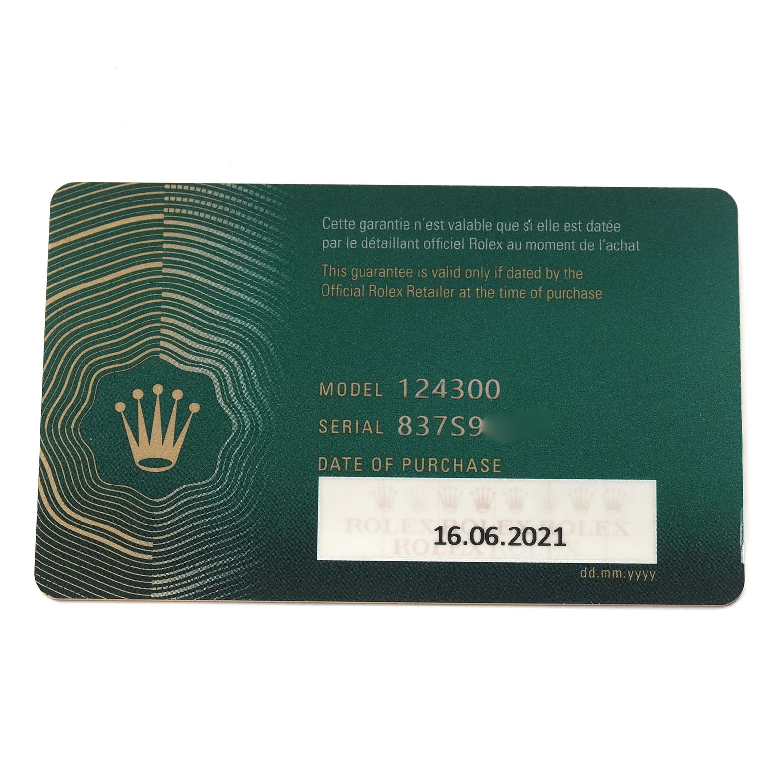 The image shows a green warranty card for the Rolex Oyster Perpetual 124300 Men's Stainless Steel Green Dial 124300 Men's Stainless Steel Green Dial, model 124300, detailing purchase date and serial number.