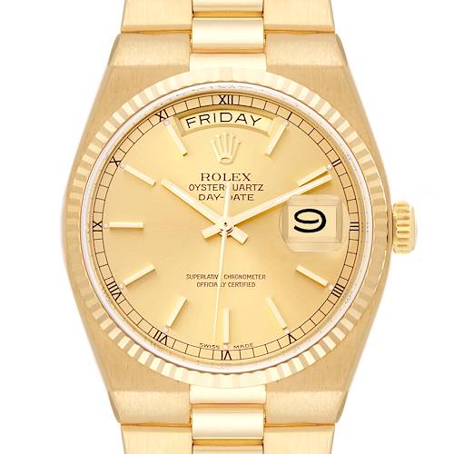 The image shows a front view of a Rolex Oysterquartz 19018 Men's Yellow Gold Champagne Dial 19018 Men's Yellow Gold Champagne Dial Day-Date watch, featuring the dial, hands, bezel, and part of the bracelet.