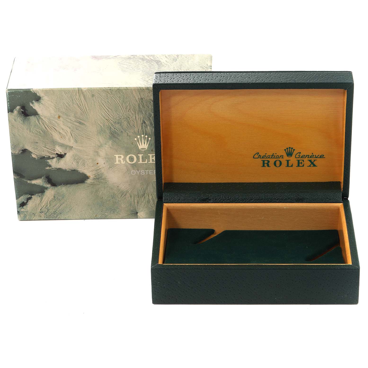 This image shows an open Rolex watch box for the Date model, with an outer box in the background.
