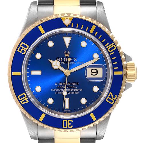 This is a close-up view of a Rolex Submariner 16613 Men's Steel and Gold (two tone) Blue Dial 16613 Men's Steel and Gold (two tone) Blue Dial watch displaying the dial, bezel, and part of the strap.