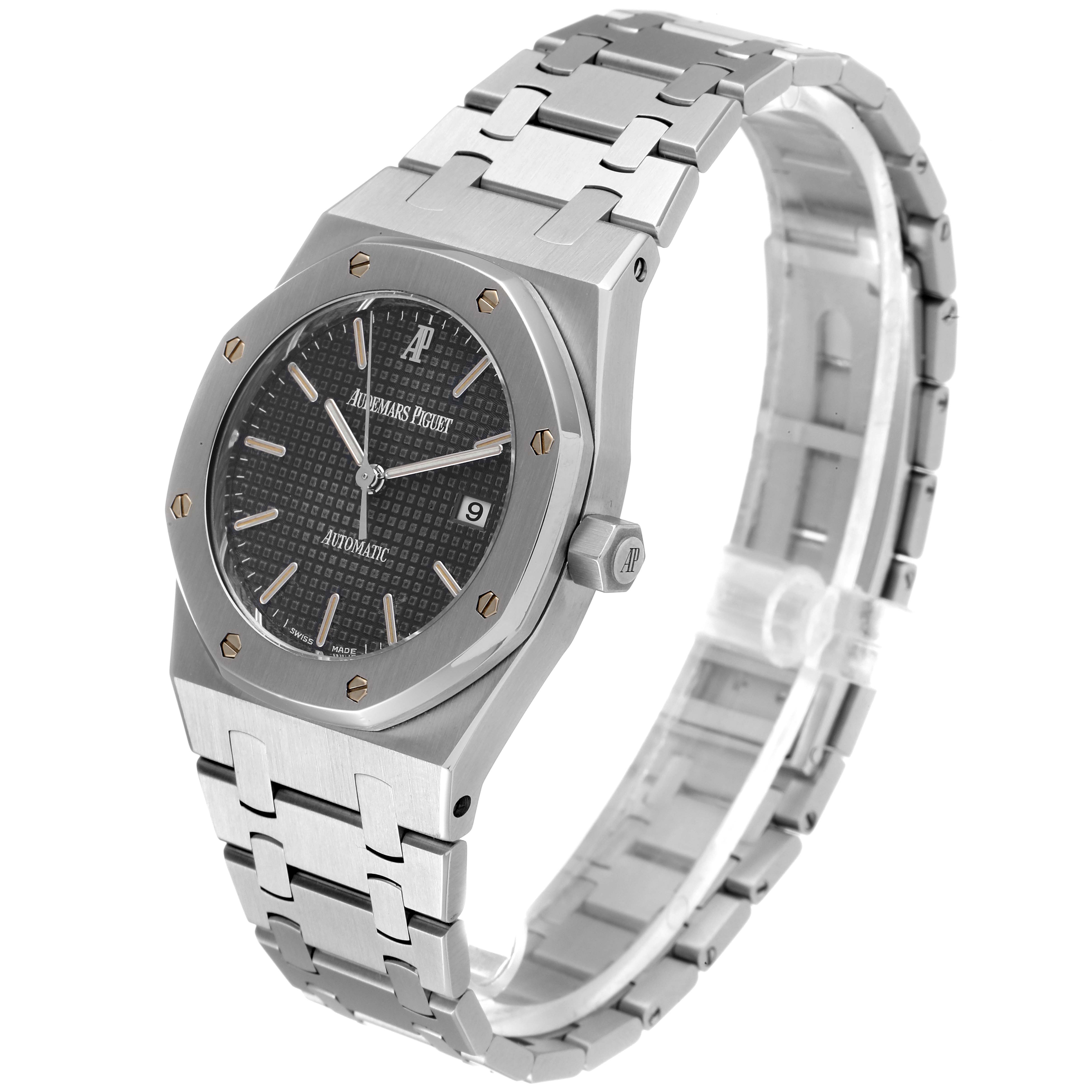 The image shows an angled view of the Audemars Piguet Royal Oak 15000ST.OO.0789ST.05 Men's Stainless Steel Grey Dial 15000ST.OO.0789ST.05 Men's Stainless Steel Grey Dial watch, highlighting its face, bezel, and bracelet.