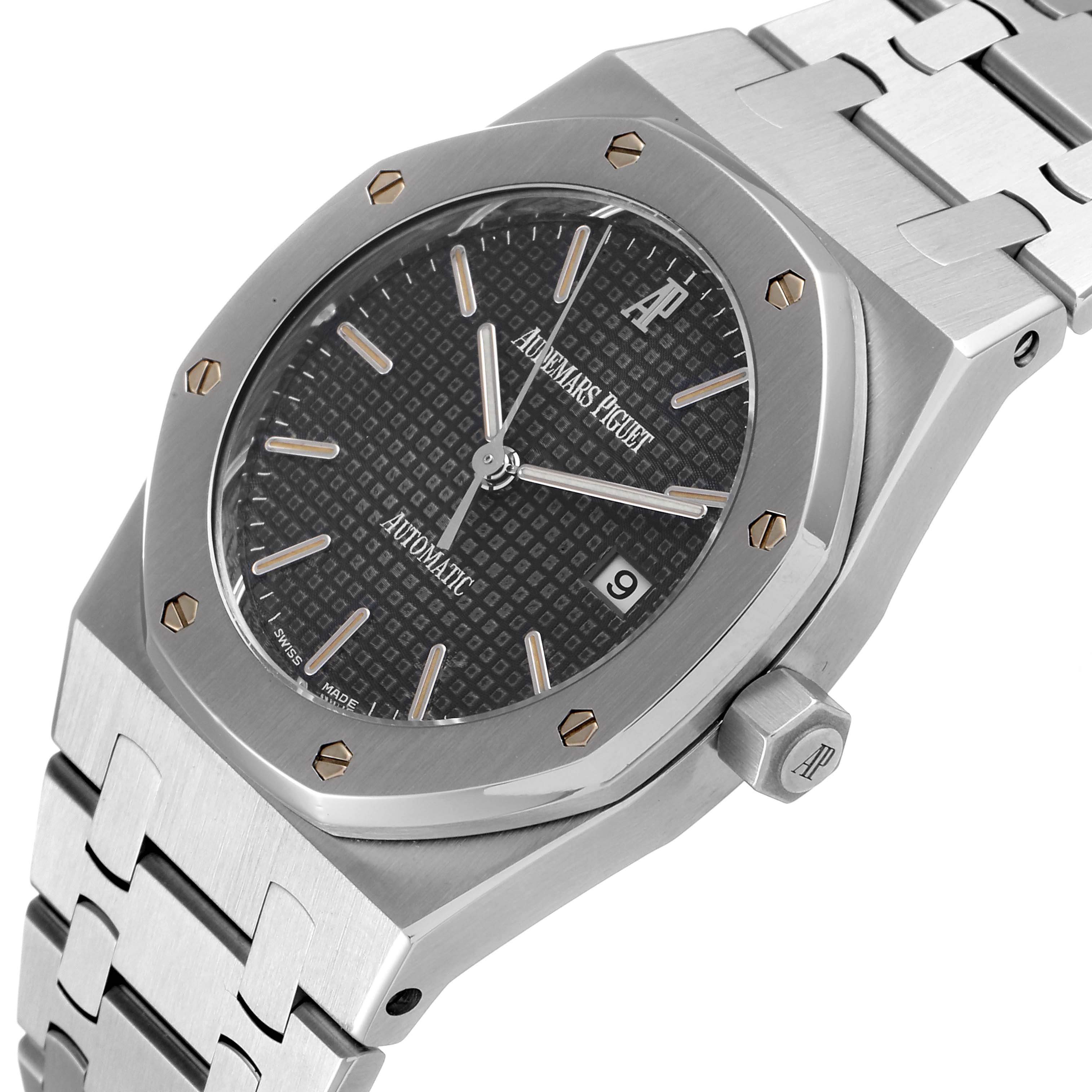 This image shows a close-up, angled view of the Audemars Piguet Royal Oak 15000ST.OO.0789ST.05 Men's Stainless Steel Grey Dial 15000ST.OO.0789ST.05 Men's Stainless Steel Grey Dial watch face, bezel, and part of the bracelet.