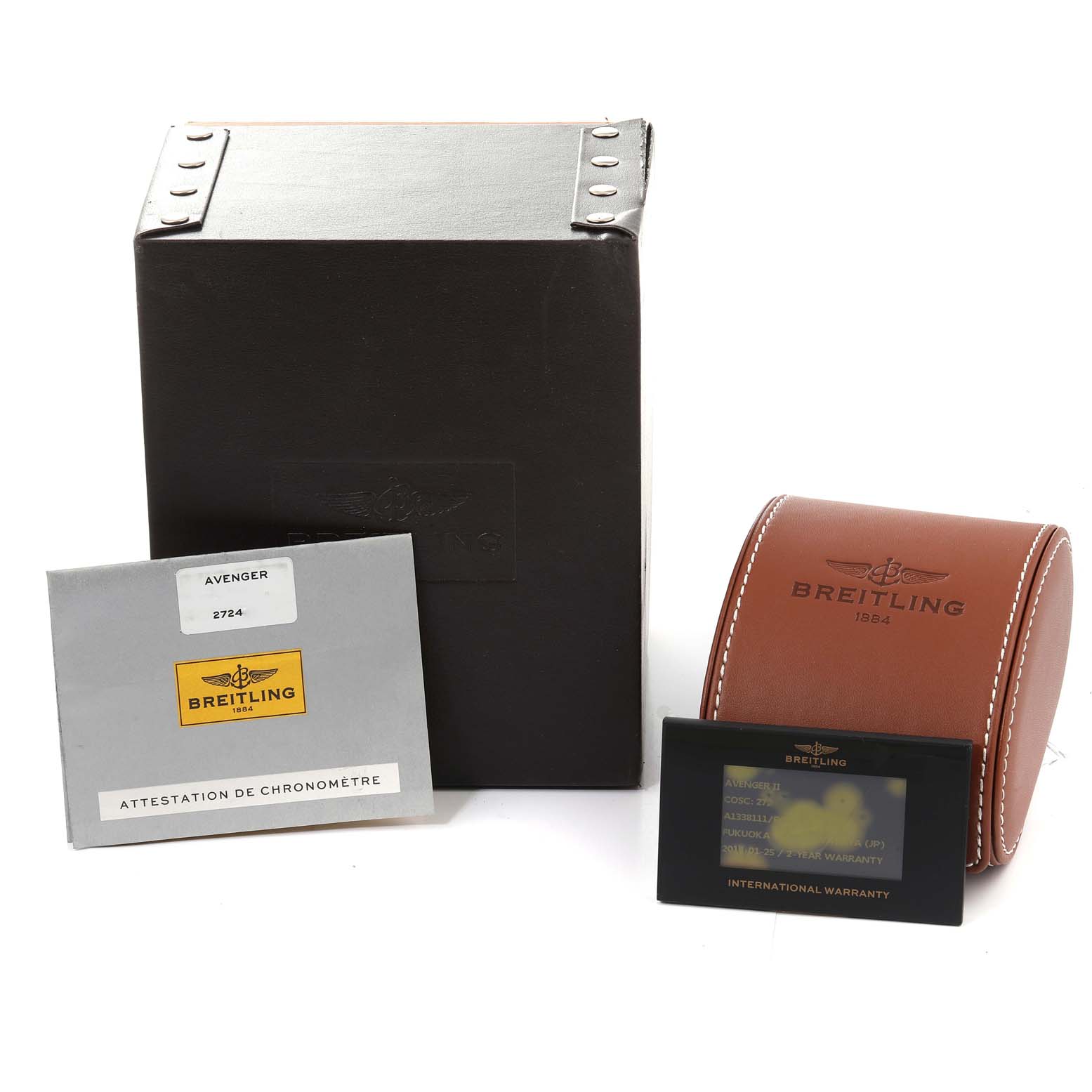 The image shows the Breitling Avenger A13381 Men's Stainless Steel Black Dial A13381 Men's Stainless Steel Black Dial watch's box, warranty card, and documentation from a slightly elevated front angle.