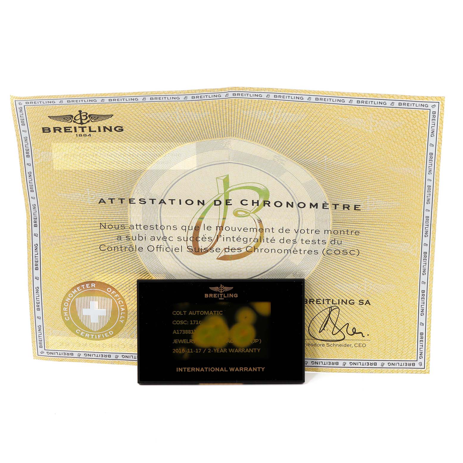 The image shows the warranty card and chronometer certificate for the Breitling Colt A17388 Men's Stainless Steel White Dial A17388 Men's Stainless Steel White Dial model.