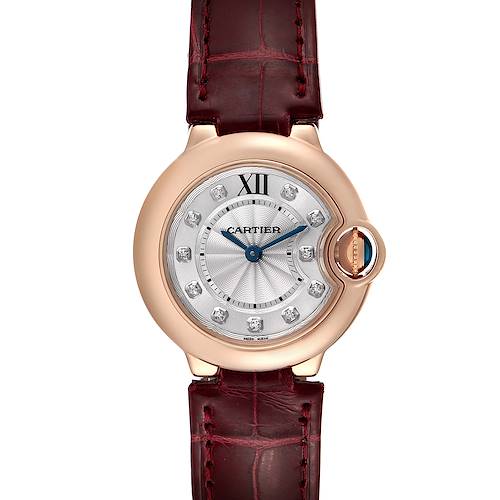 The image shows a front view of the Cartier Ballon Bleu WE902050 Women's Rose Gold Silver Dial WE902050 Women's Rose Gold Silver Dial watch, featuring a round face with diamond markers and a burgundy leather strap.