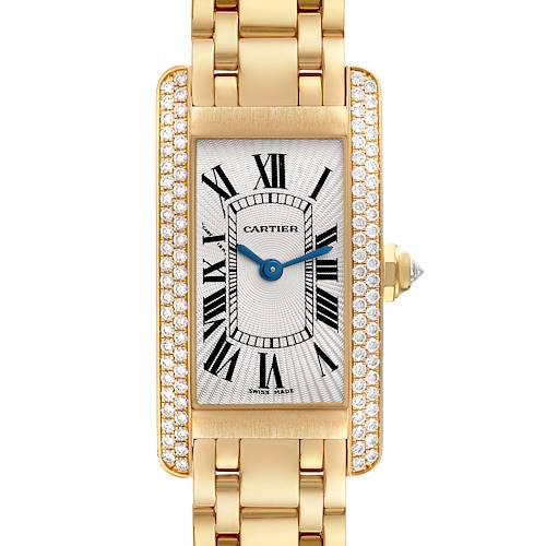 The image shows a frontal view of the Cartier Tank Americaine WB7012K2 Women's Yellow Gold Silver Dial WB7012K2 Women's Yellow Gold Silver Dial watch, highlighting its rectangular face, Roman numerals, diamond-lined bezel, and gold bracelet.