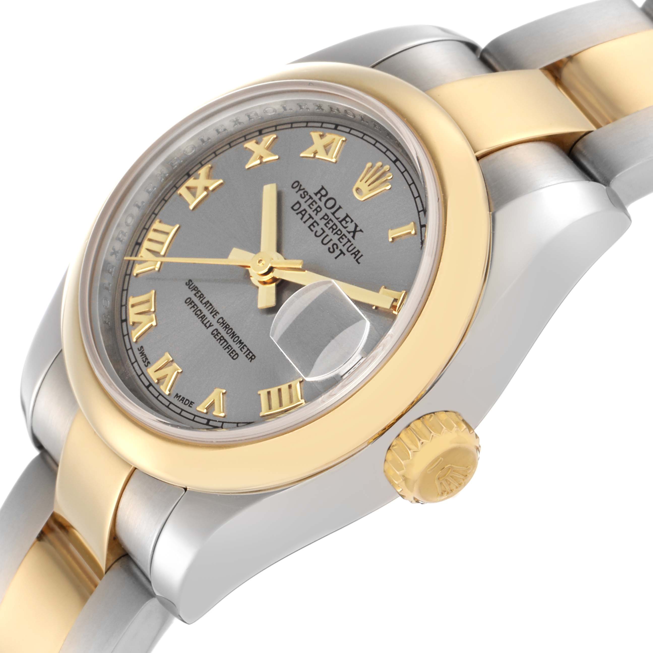The Rolex Datejust 179163 Women's Steel and Gold (two tone) Grey Dial 179163 Women's Steel and Gold (two tone) Grey Dial watch is shown from a low angle, highlighting the bezel, crown, and part of the bracelet.