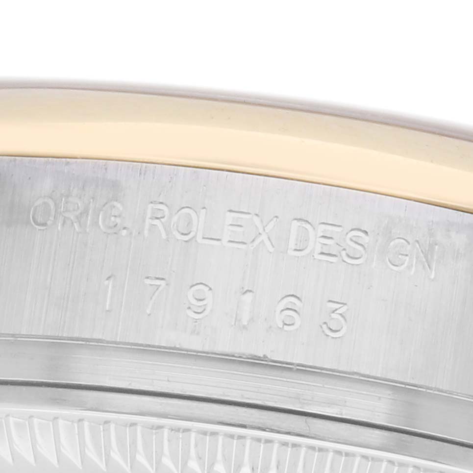 The image shows a close-up of the side of a Rolex Datejust 179163 Women's Steel and Gold (two tone) Grey Dial 179163 Women's Steel and Gold (two tone) Grey Dial watch, focusing on the engraved model number and "ORIG. ROLEX DESIGN."