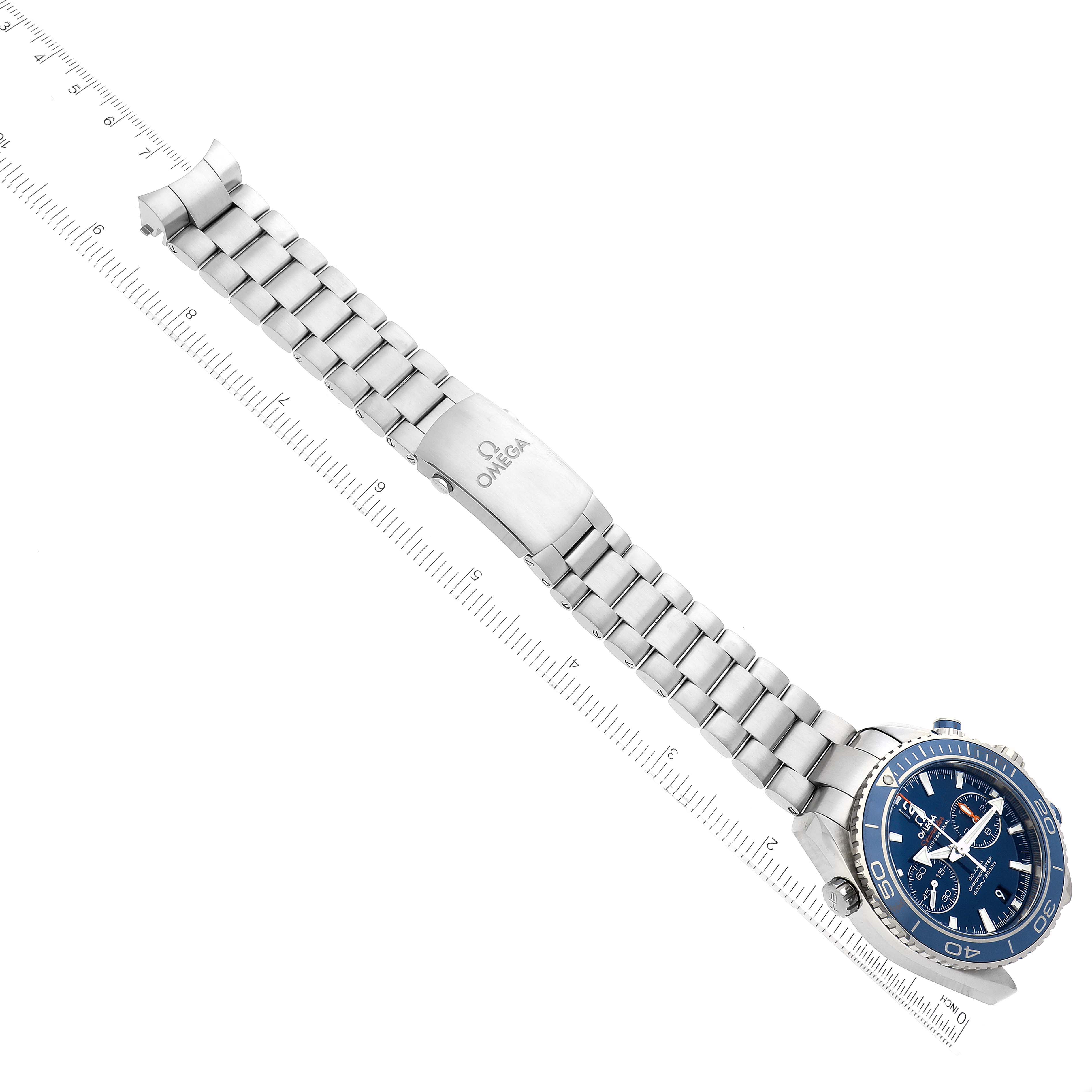 The Omega Planet Ocean 232.90.46.51.03.001 Men's Titanium Blue Dial 232.90.46.51.03.001 Men's Titanium Blue Dial watch is shown from an overhead angle, displaying its stainless steel bracelet and blue dial.