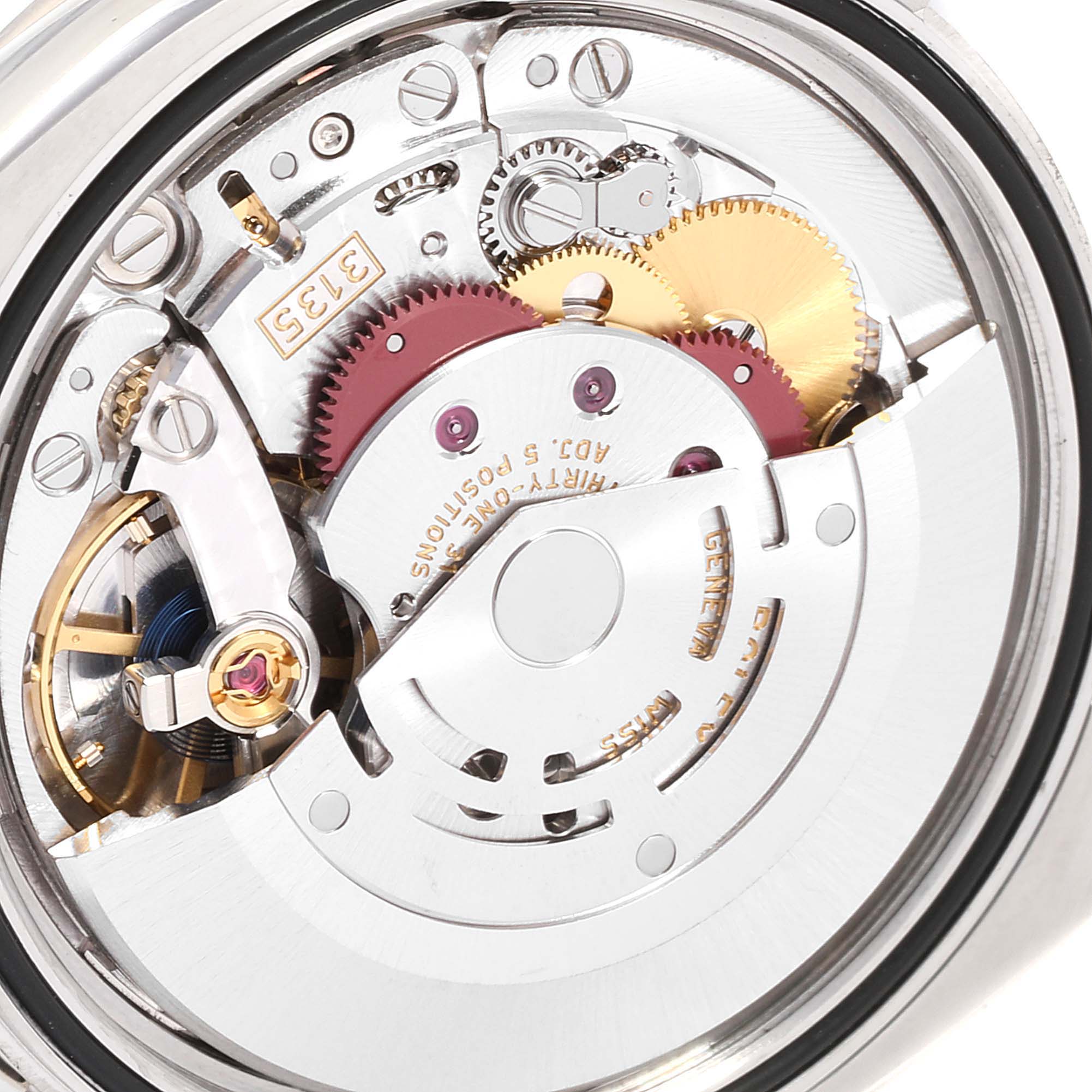 The image shows a close-up of the movement of a Rolex Datejust 116244 Men's Stainless Steel Mother of Pearl Dial 116244 Men's Stainless Steel Mother of Pearl Dial watch, highlighting gears, jewels, and the rotor.