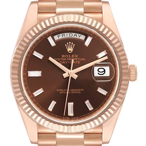 This image shows a front view of a Rolex President 228235 Men's Rose Gold Brown Dial 228235 Men's Rose Gold Brown Dial model watch, highlighting its dial, bezel, and part of the bracelet.
