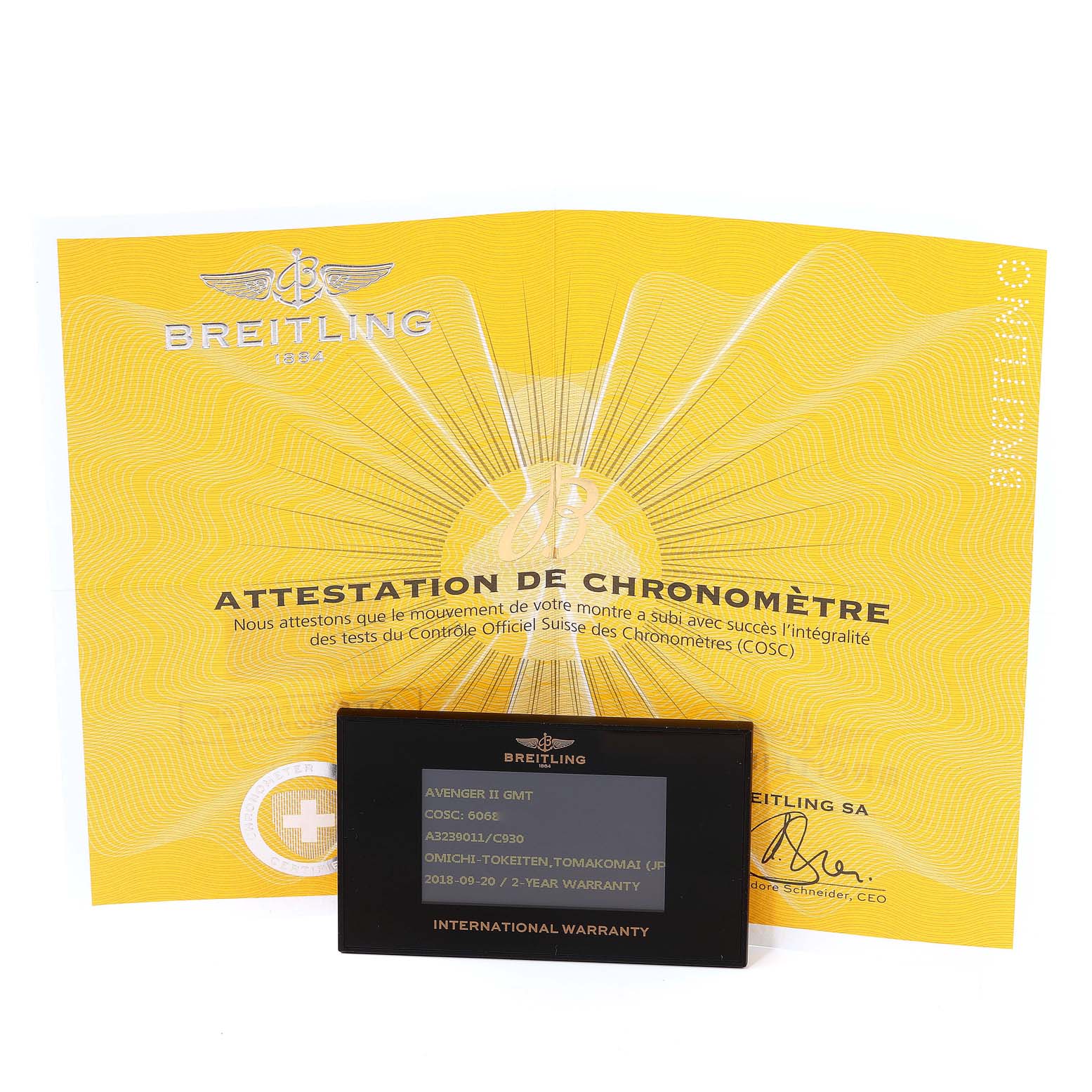 The image shows a certification document and warranty card for a Breitling Avenger A3239011-C872-170A Men's Stainless Steel Mother of Pearl Dial A3239011-C872-170A Men's Stainless Steel Mother of Pearl Dial model watch.