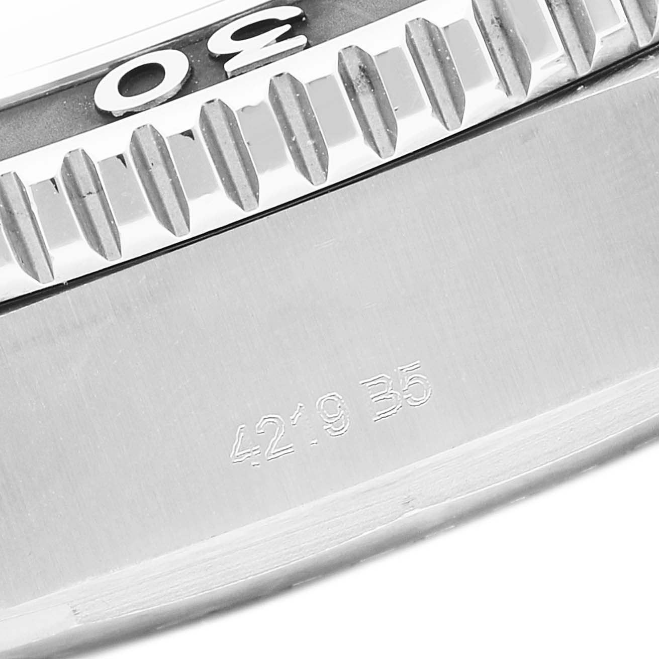 The image shows a close-up of the bezel and part of the case of a Breitling Superocean A17367021I1A1 Men's Stainless Steel Yellow Dial A17367021I1A1 Men's Stainless Steel Yellow Dial watch.