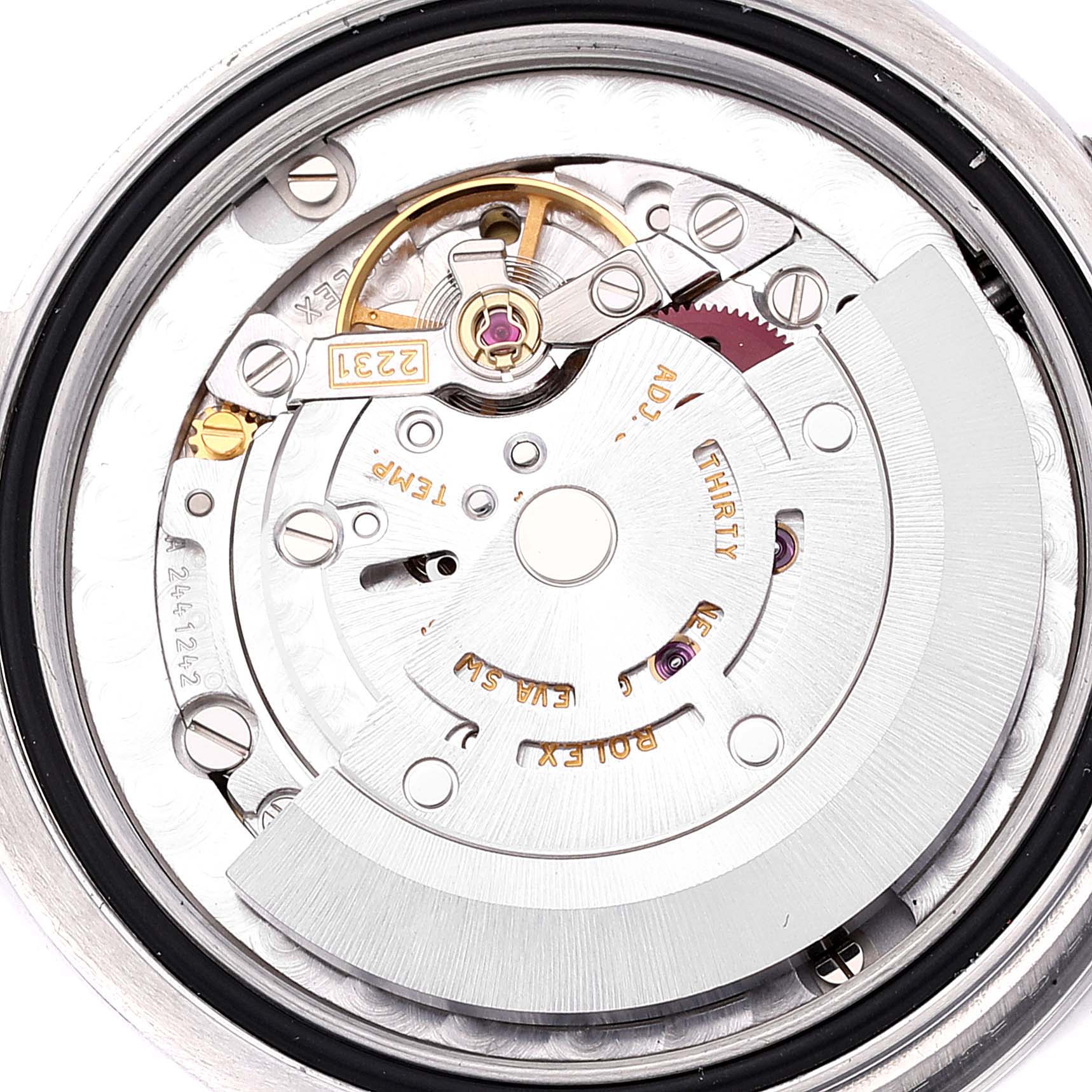 This image shows a close-up view of the internal movement parts of a Rolex Mid-Size 177200 Women's Stainless Steel Blue Dial 177200 Women's Stainless Steel Blue Dial model watch.