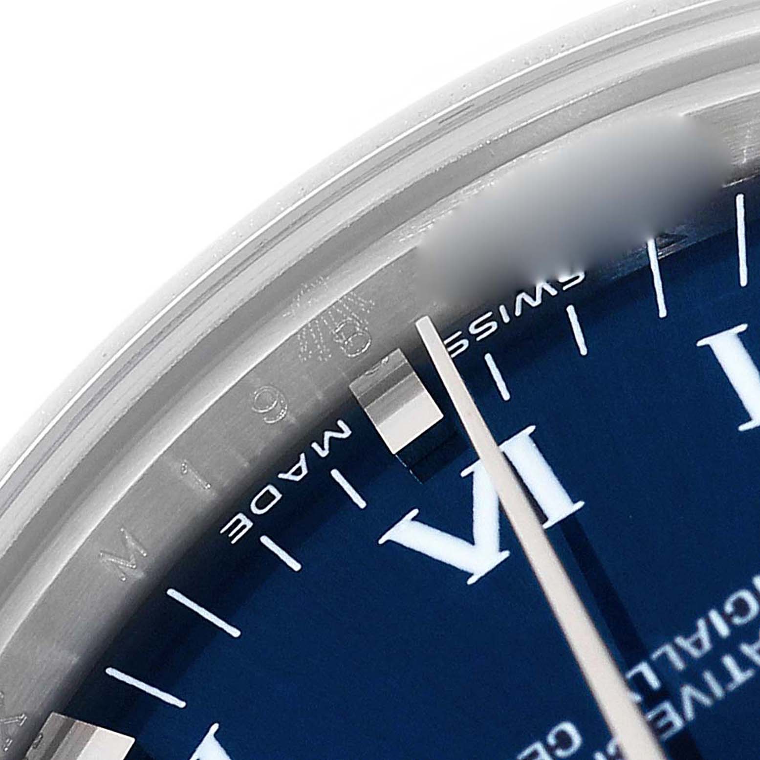 This is a close-up angle showing the dial and part of the bezel of the Rolex Mid-Size 177200 Women's Stainless Steel Blue Dial 177200 Women's Stainless Steel Blue Dial model watch.