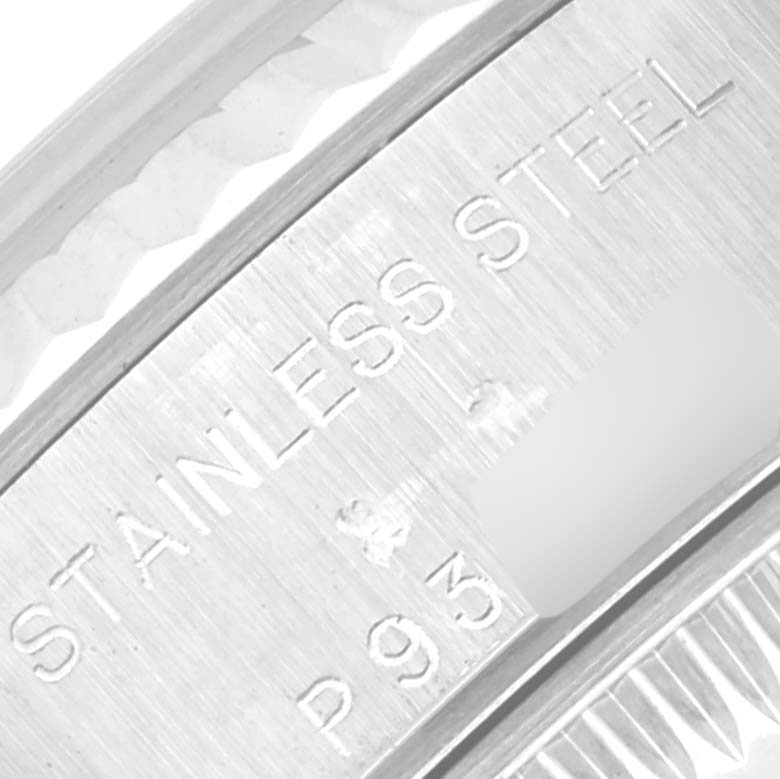 This image shows a close-up of the engraved text on the inside case of a Rolex Datejust 79174 Women's Stainless Steel Silver Dial 79174 Women's Stainless Steel Silver Dial watch, emphasizing "STAINLESS STEEL."