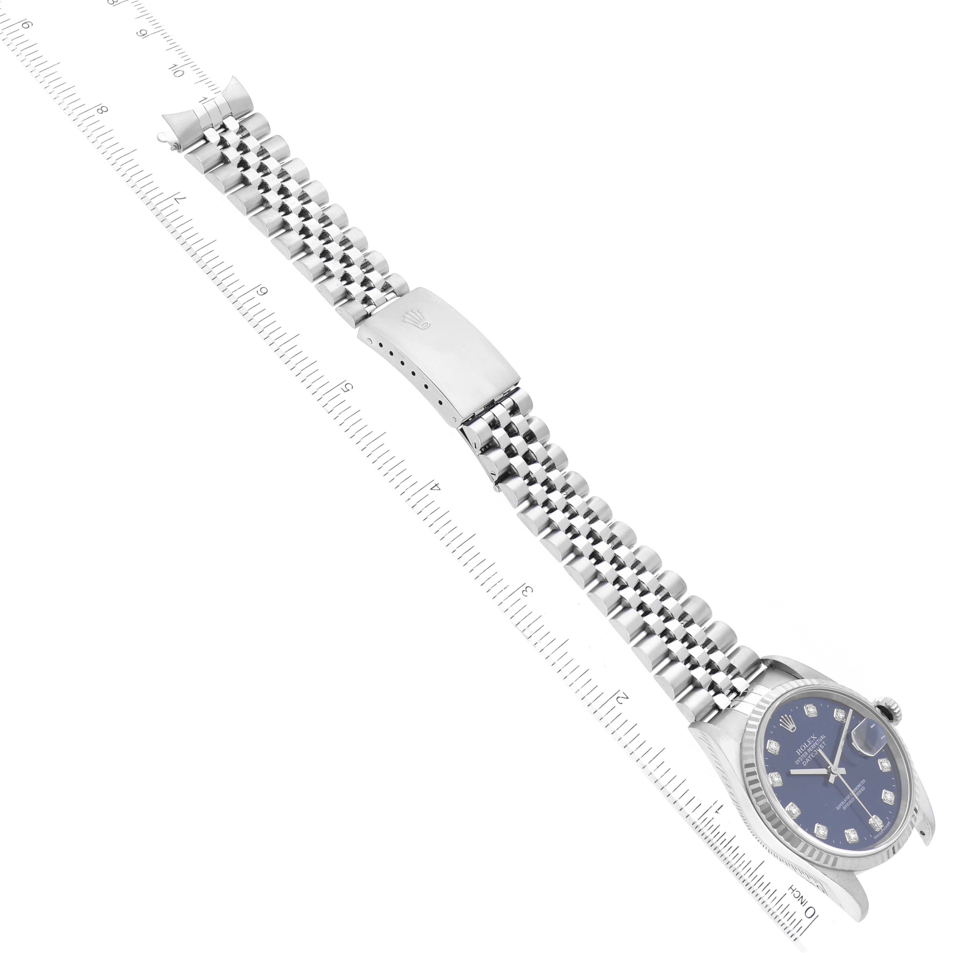 The image shows a Rolex Datejust 16234 Men's Stainless Steel Blue Dial 16234 Men's Stainless Steel Blue Dial watch laid flat, featuring the bracelet, clasp, and watch face.