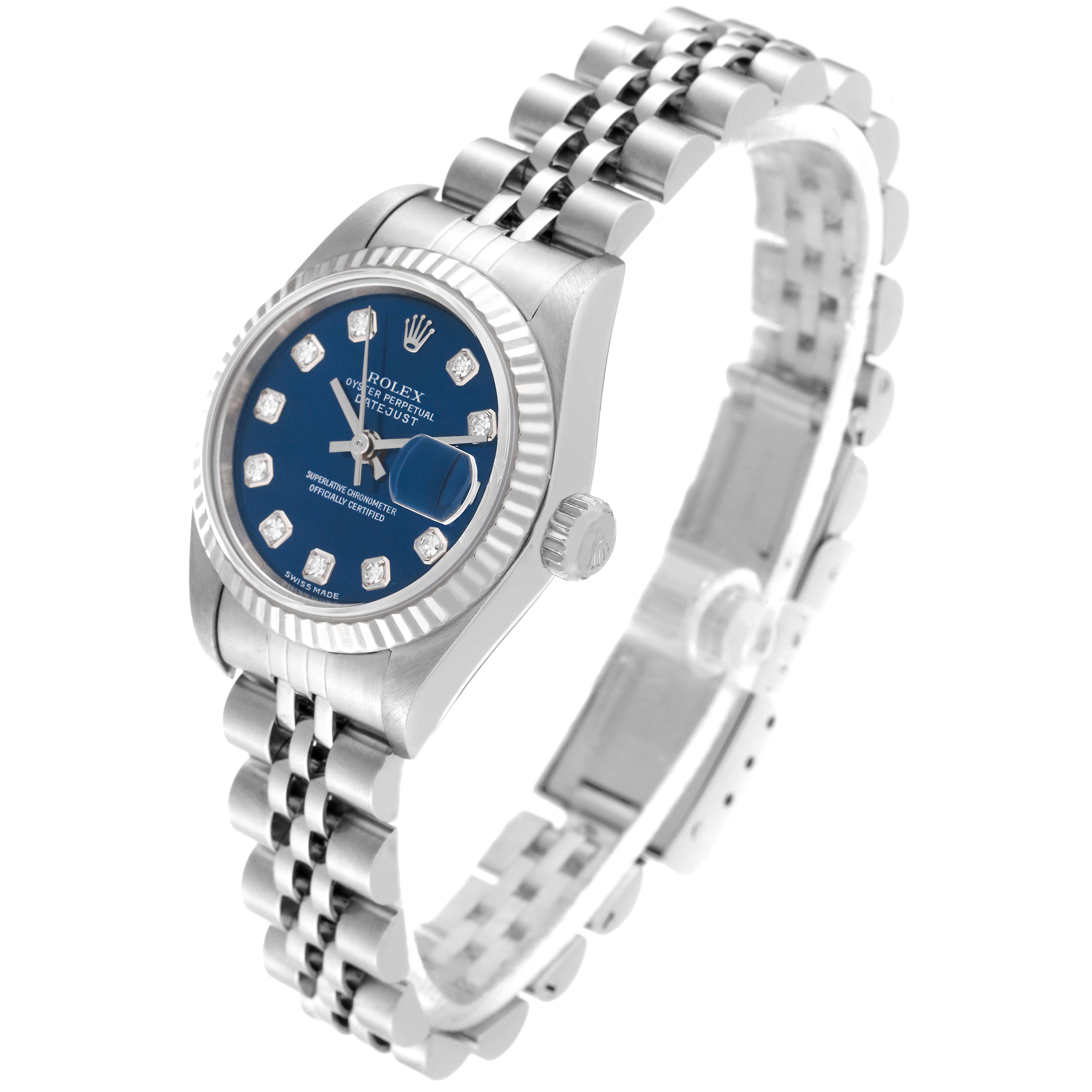The image shows a Rolex Datejust 79174 Women's Stainless Steel Blue Dial 79174 Women's Stainless Steel Blue Dial watch from an angled side view, highlighting the blue dial, fluted bezel, and jubilee bracelet.