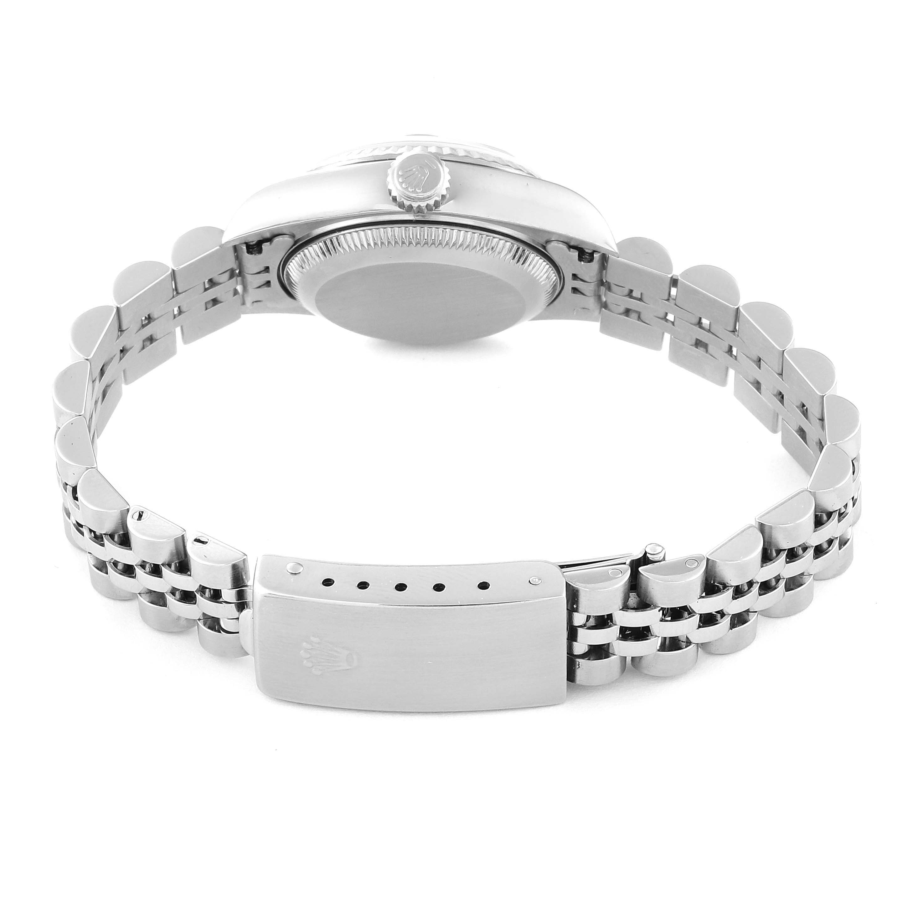 This image shows the back view of a Rolex Datejust 79174 Women's Stainless Steel Blue Dial 79174 Women's Stainless Steel Blue Dial, highlighting its case back, crown, and metal bracelet with a clasp.