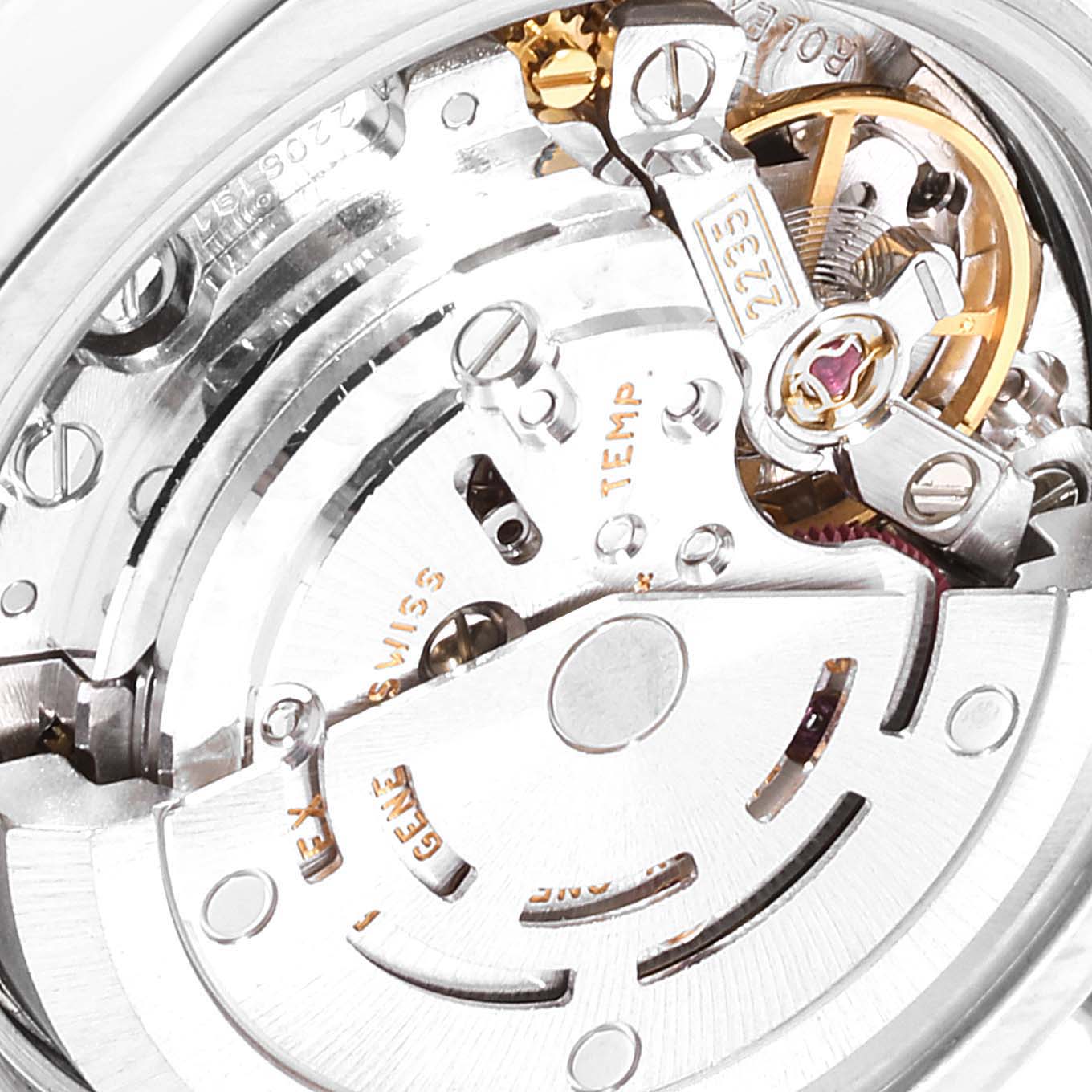 This image shows a close-up of the movement mechanism inside a Rolex Datejust 179174 Women's Stainless Steel Blue Dial 179174 Women's Stainless Steel Blue Dial watch.