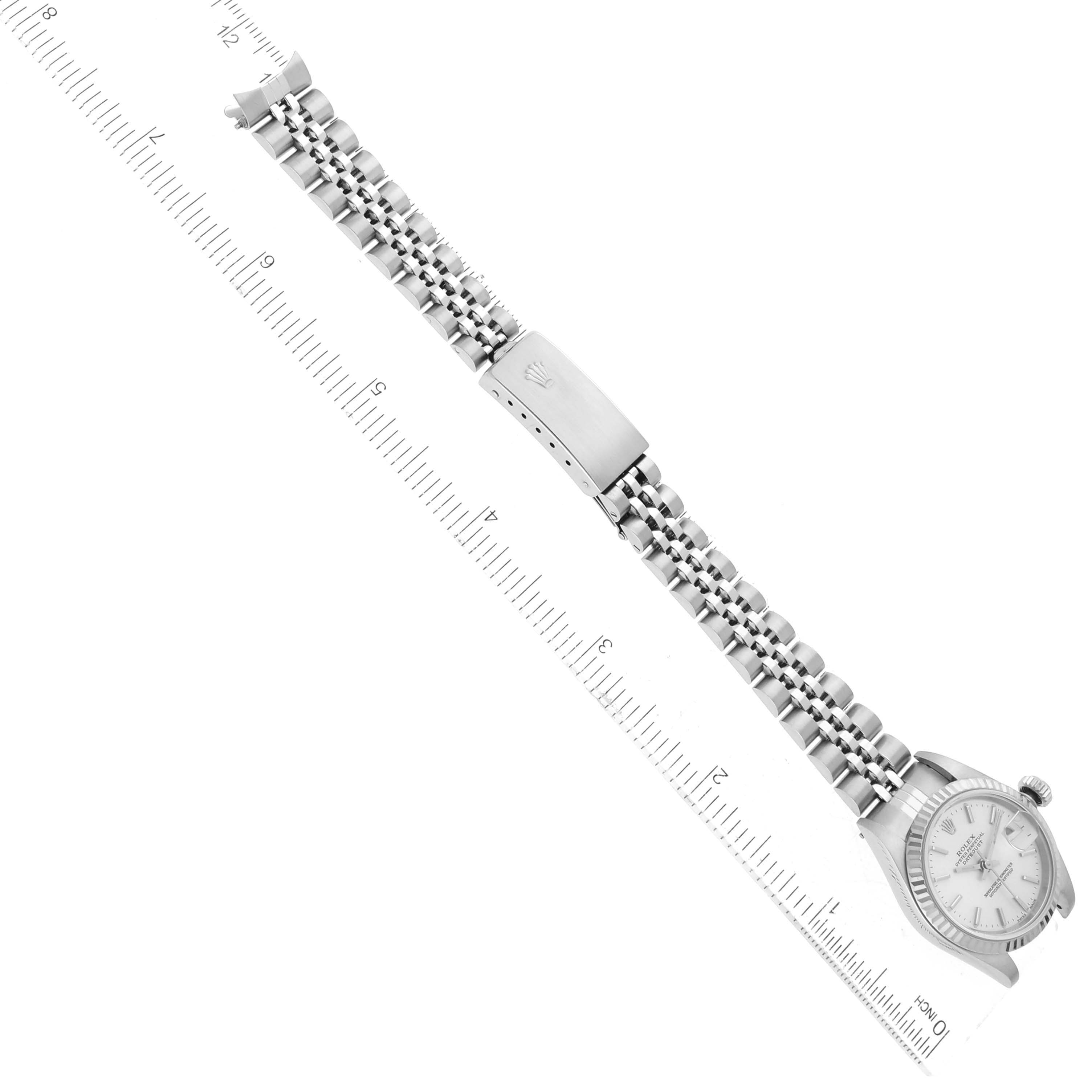 This image shows a top-down view of a Rolex Datejust 79174 Women's Stainless Steel Silver Dial 79174 Women's Stainless Steel Silver Dial watch, including the face, bezel, bracelet, and clasp.