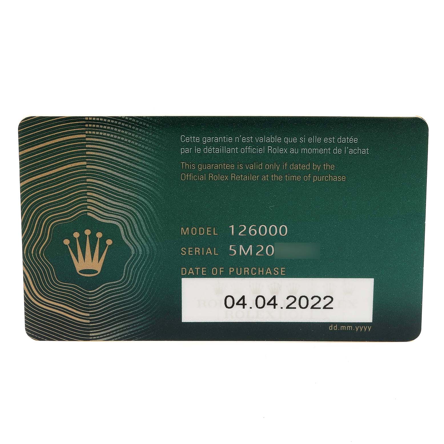 This is a guarantee card for a Rolex Oyster Perpetual 126000 Men's Stainless Steel Green Dial 126000 Men's Stainless Steel Green Dial model 126000, showing the serial number and date of purchase.