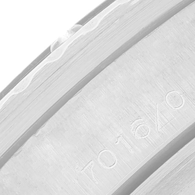 This image shows a close-up of an engraved number on the bezel of a Tudor Submariner 7016 Men's Stainless Steel Black Dial 7016 Men's Stainless Steel Black Dial watch.