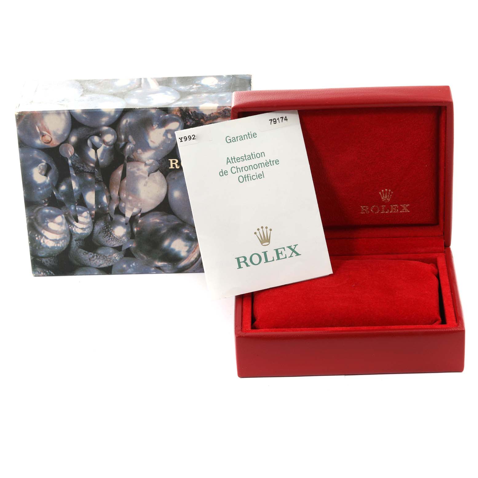 The image shows the packaging, warranty, and a red case for a Rolex Datejust 79174 Women's Stainless Steel Pink Dial 79174 Women's Stainless Steel Pink Dial watch.