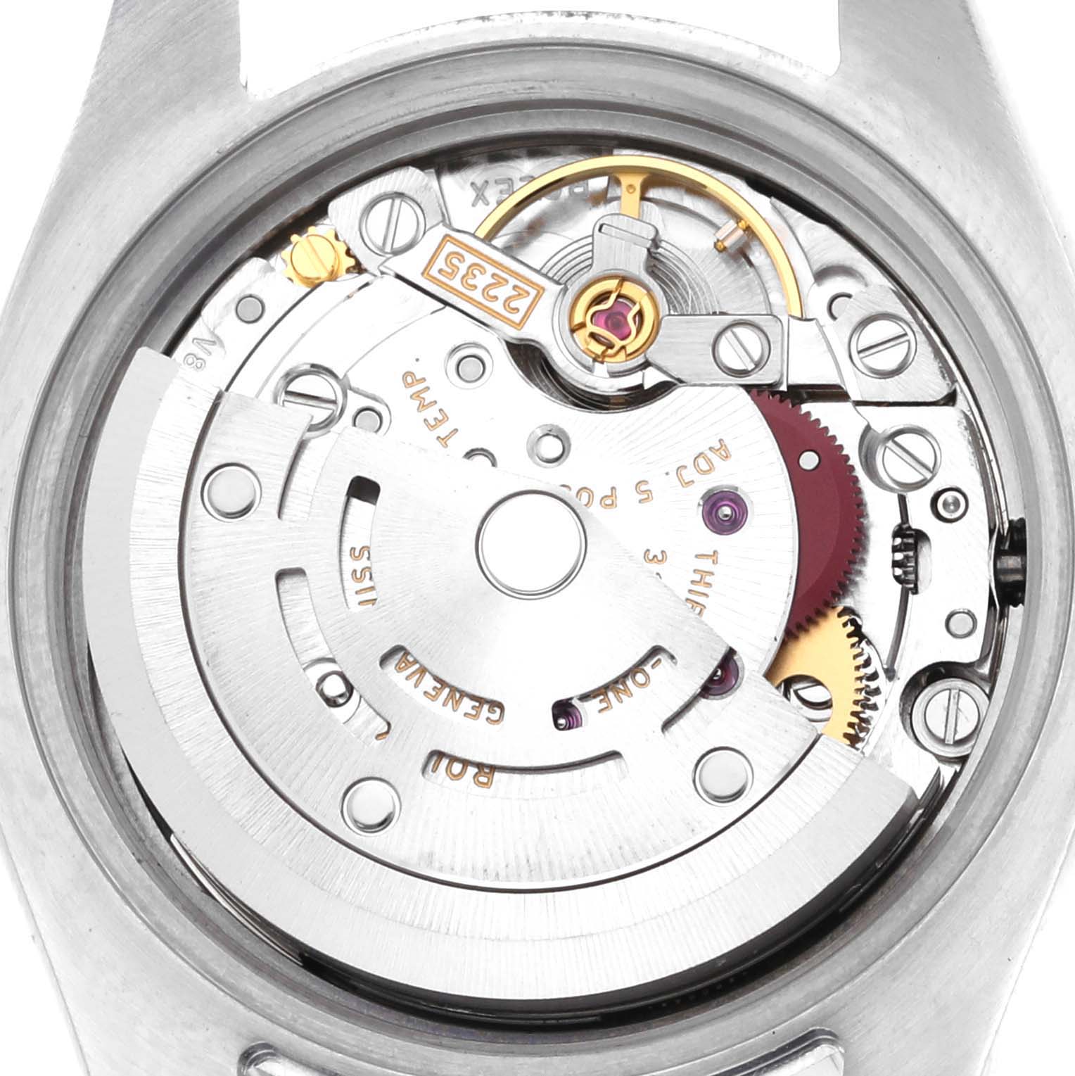 The image shows a close-up of the movement inside a Rolex Datejust 179174 Women's Stainless Steel Black Dial 179174 Women's Stainless Steel Black Dial watch, focusing on the intricate mechanical components.