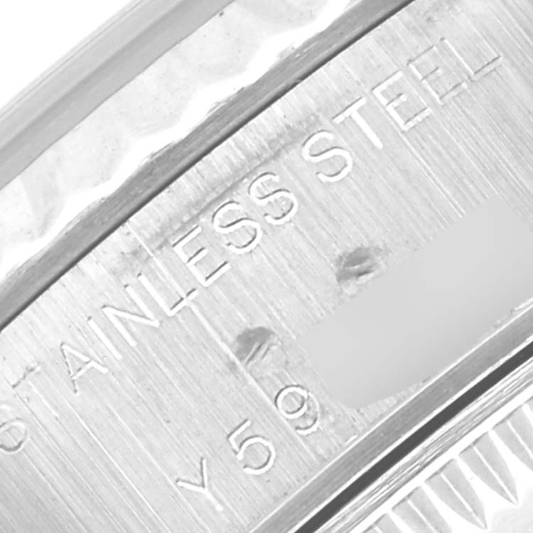Close-up of the side of a Rolex Datejust 79174 Women's Stainless Steel Mother of Pearl Dial 79174 Women's Stainless Steel Mother of Pearl Dial watch showing "STAINLESS STEEL" engraved on the case.
