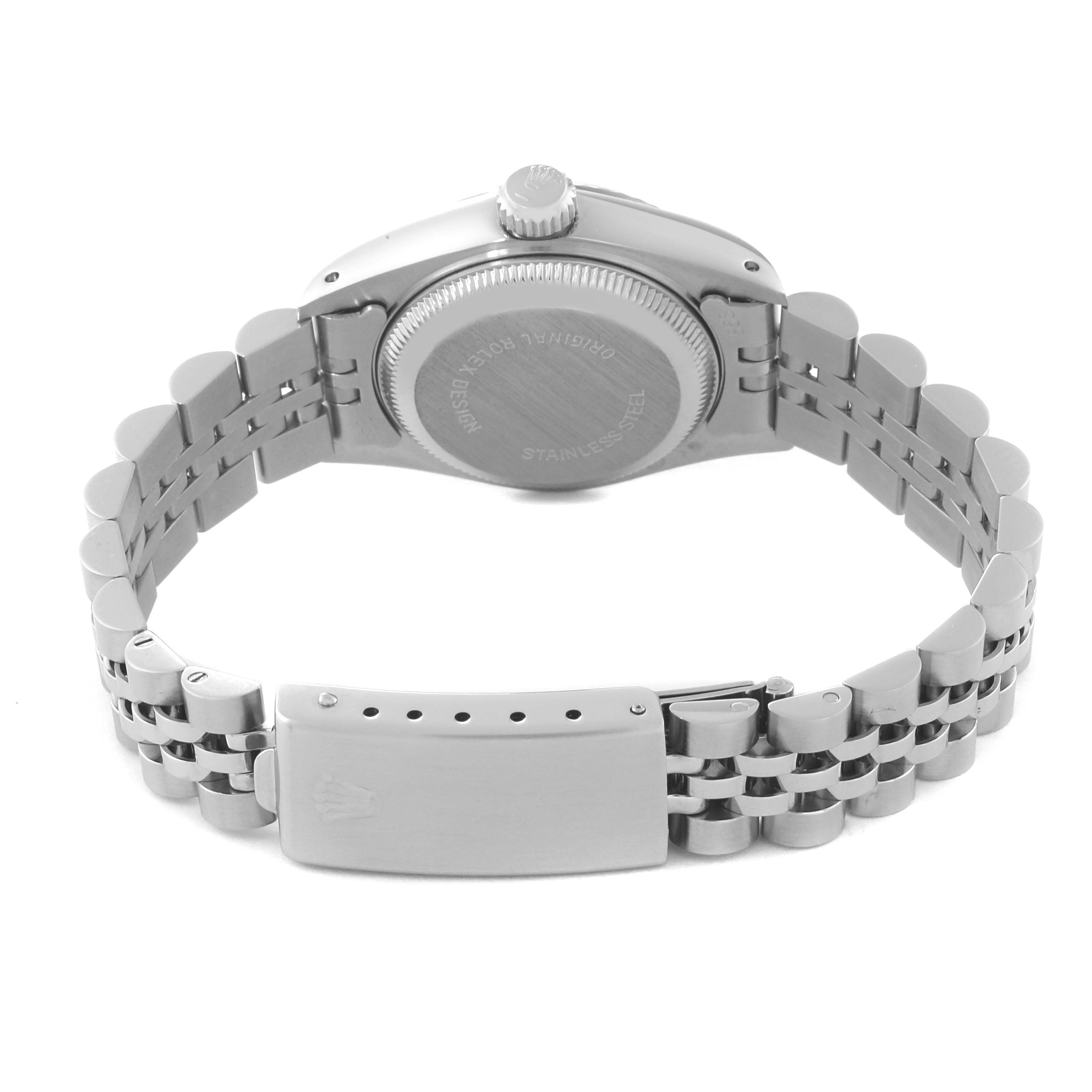 The image shows the back view of a Rolex Datejust 69174 Women's Stainless Steel Silver Dial 69174 Women's Stainless Steel Silver Dial watch highlighting its case back and bracelet clasp.
