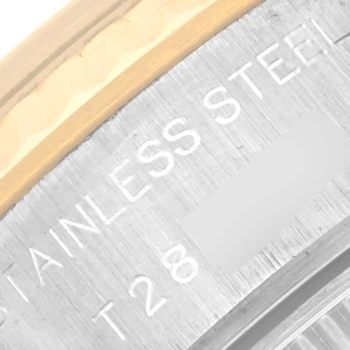 The image shows a close-up of the side of a Rolex Datejust 69173 Women's Steel and Gold (two tone) Silver Dial 69173 Women's Steel and Gold (two tone) Silver Dial watch, highlighting the stainless steel and gold components.