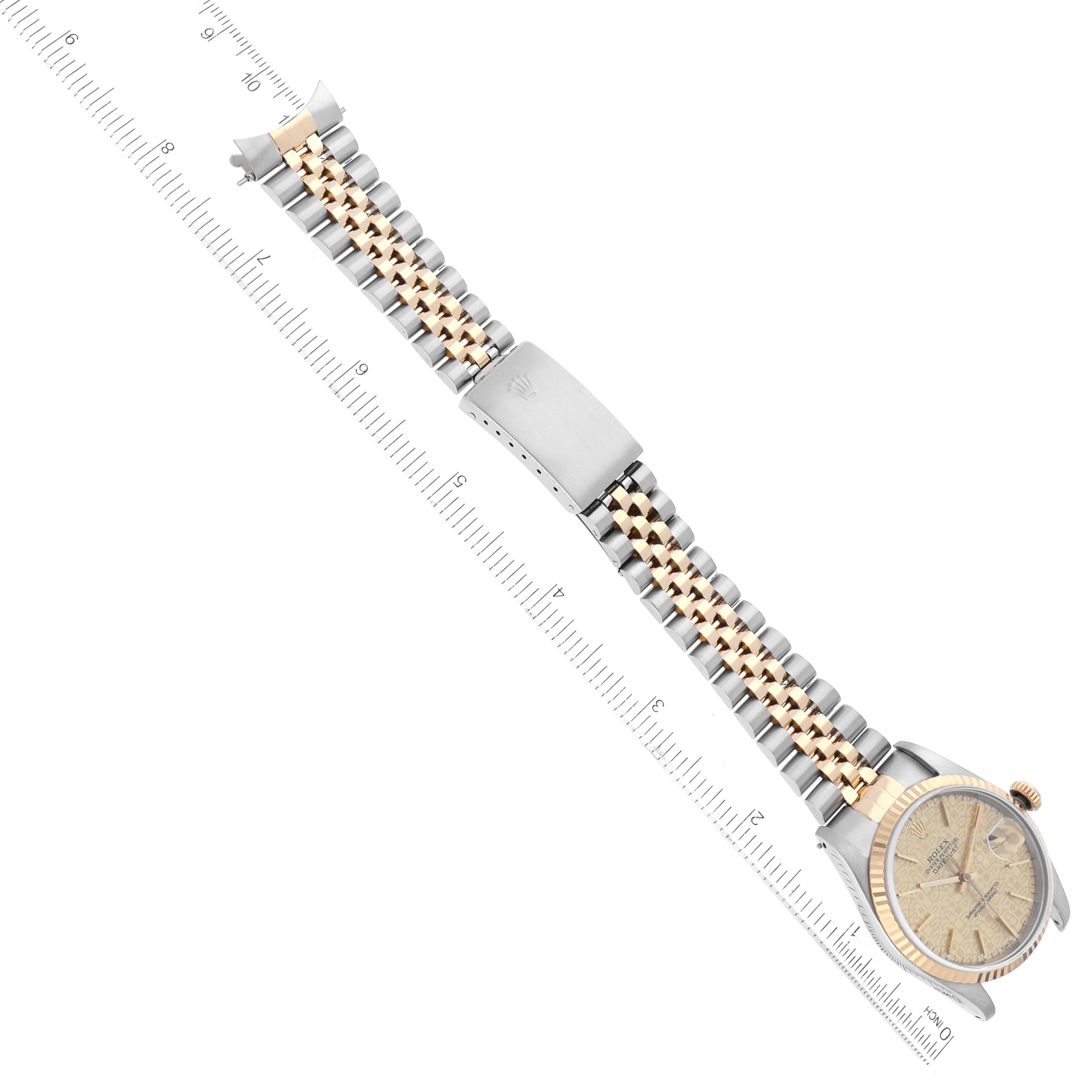The image shows a Rolex Datejust 16233 Men's Steel and Gold (two tone) Champagne Dial 16233 Men's Steel and Gold (two tone) Champagne Dial watch laid flat with the face and the entire two-tone bracelet visible, measured against a ruler.