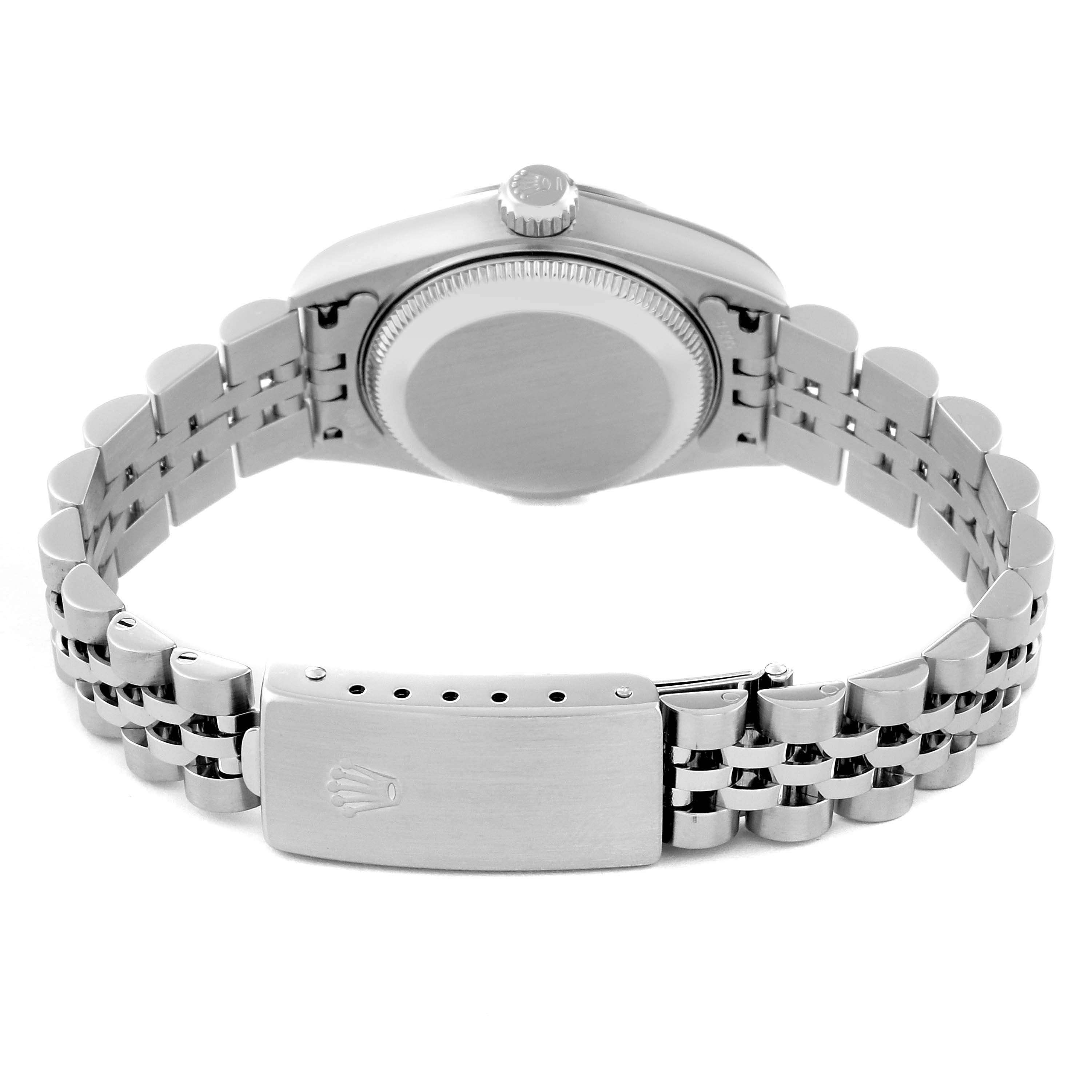 The image shows the back of the Rolex Datejust 79174 Women's Stainless Steel Mother of Pearl Dial 79174 Women's Stainless Steel Mother of Pearl Dial watch, including the caseback, crown, and Jubilee bracelet with the clasp.