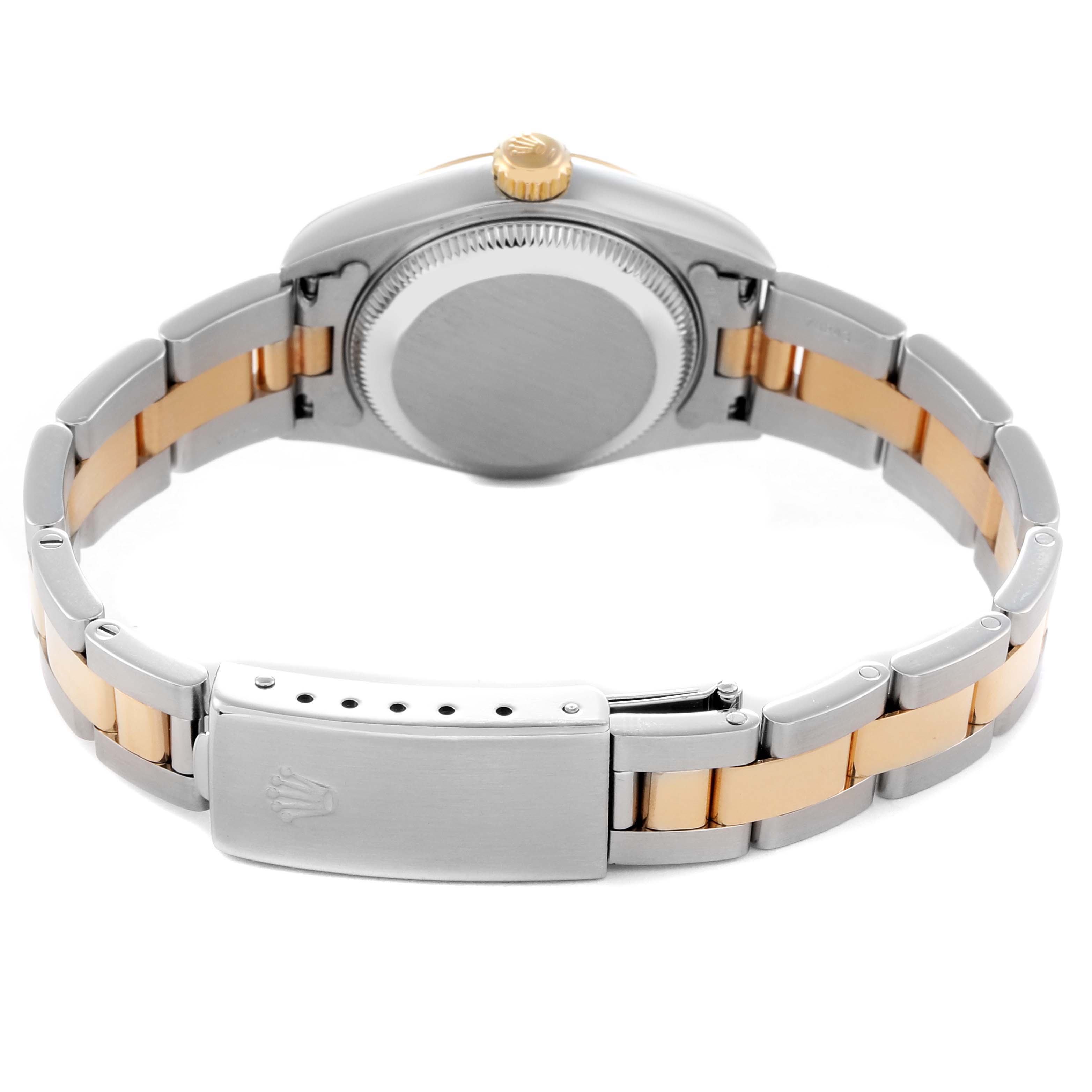 The Rolex Datejust 79163 Women's Steel and Gold (two tone) Mother of Pearl Dial 79163 Women's Steel and Gold (two tone) Mother of Pearl Dial watch is shown from the back, highlighting the case, bracelet, and clasp.