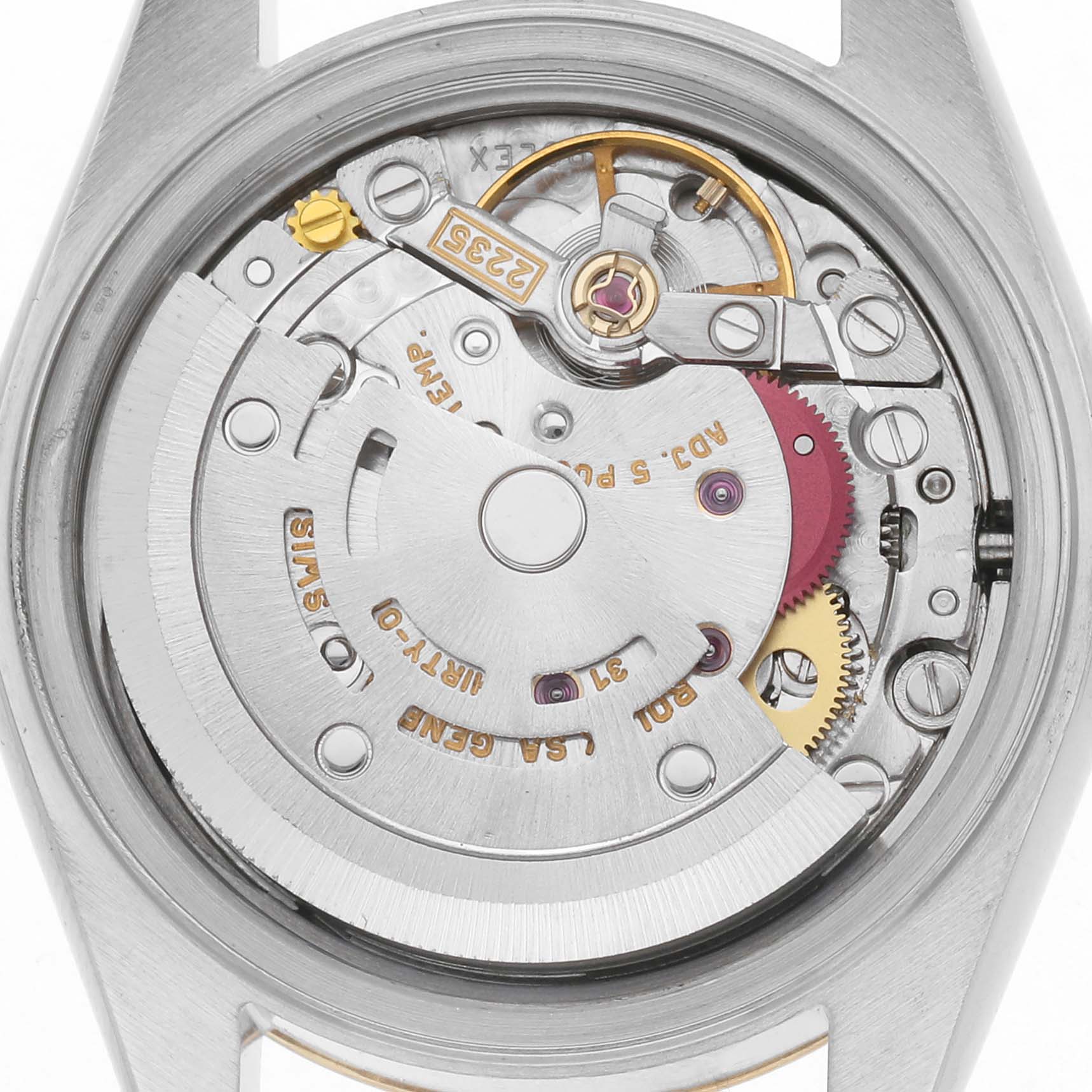 The image shows the movement of a Rolex Datejust 79173 Women's Steel and Gold (two tone) Silver Dial 79173 Women's Steel and Gold (two tone) Silver Dial, viewed from the back, displaying components like the rotor and gears.