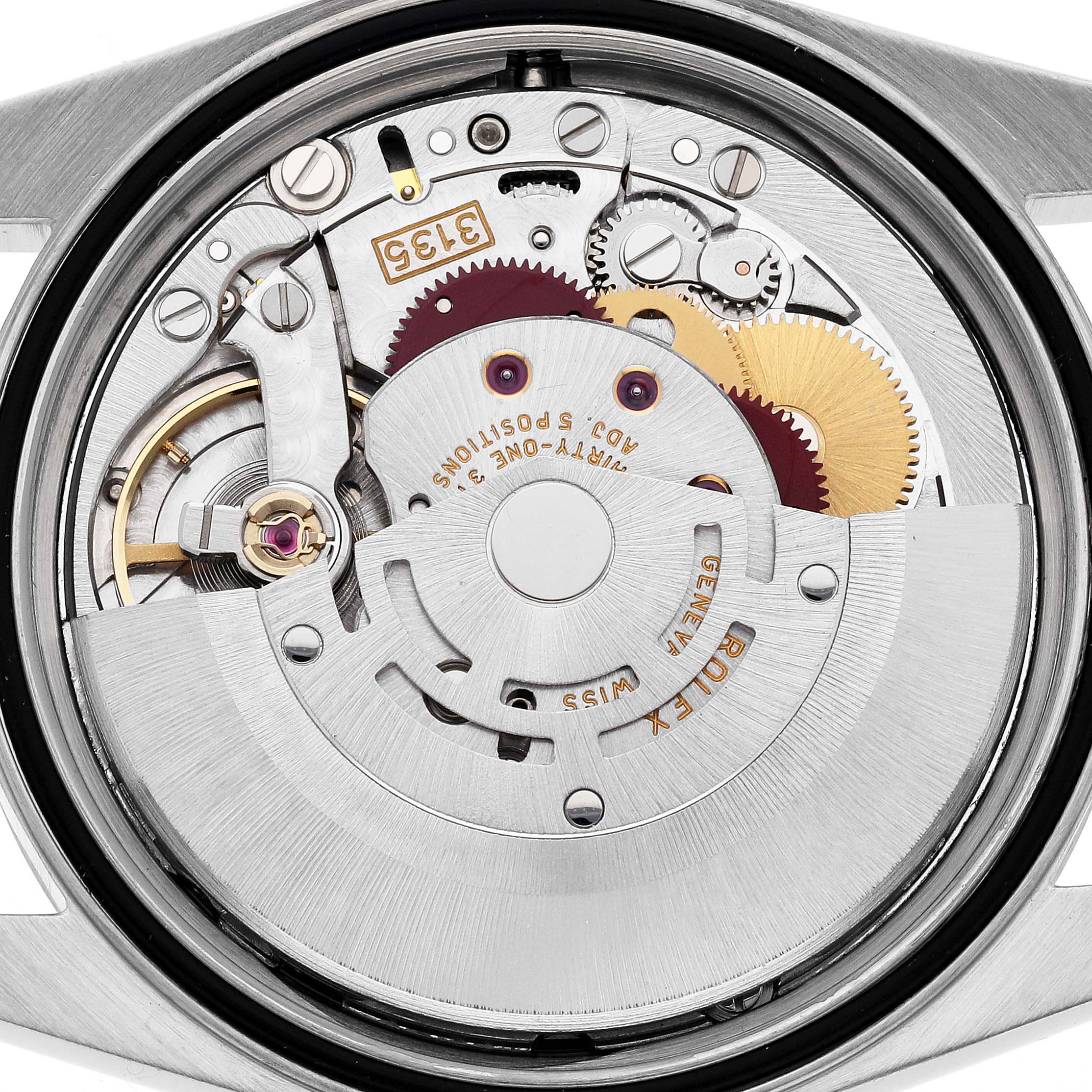 The image shows a close-up view of the movement and internal mechanism of a Rolex Datejust 16220 Men's Stainless Steel White Dial 16220 Men's Stainless Steel White Dial watch.