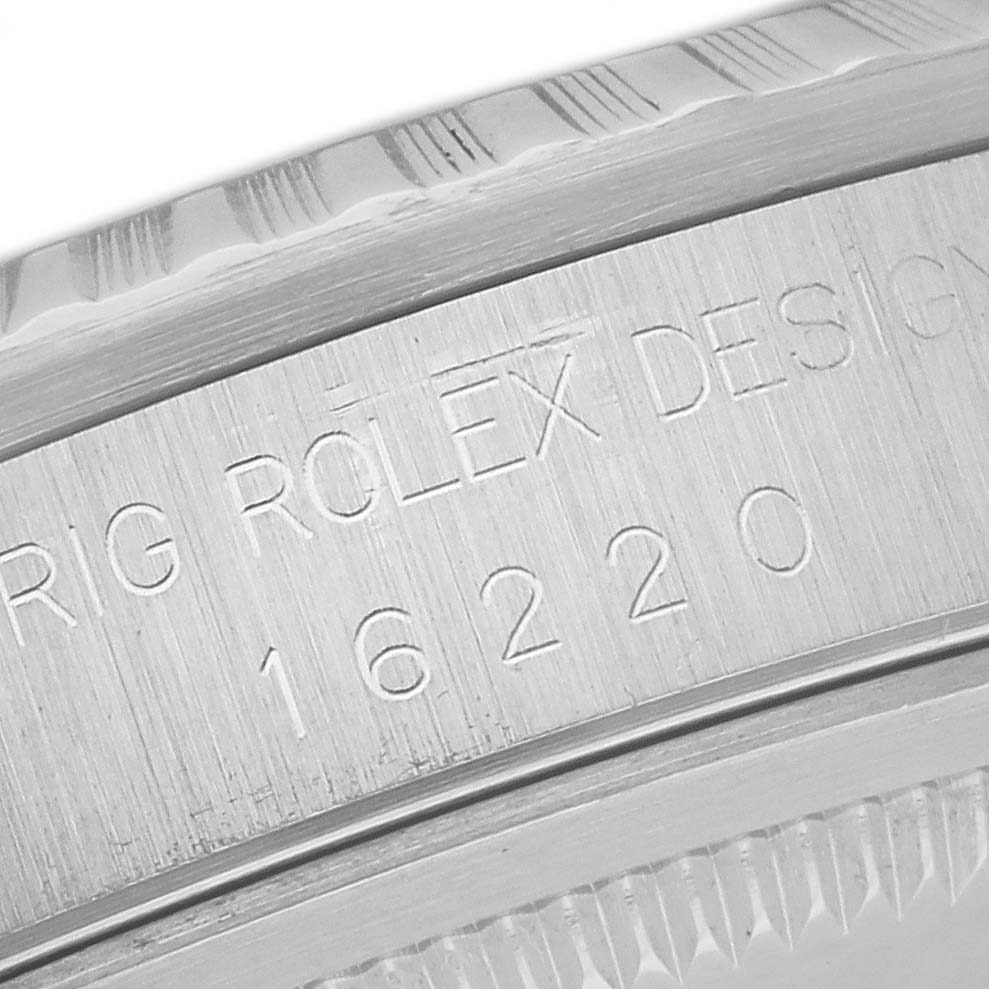 The image shows an engraved side view of the case of a Rolex Datejust 16220 Men's Stainless Steel White Dial 16220 Men's Stainless Steel White Dial model, highlighting the model number and branding.