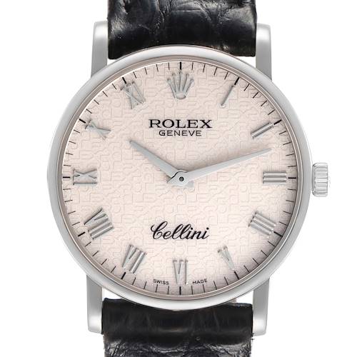 The Rolex Cellini model 5115/9 is shown from a front angle, highlighting its face, Roman numeral indices, hands, and crown with a leather strap.