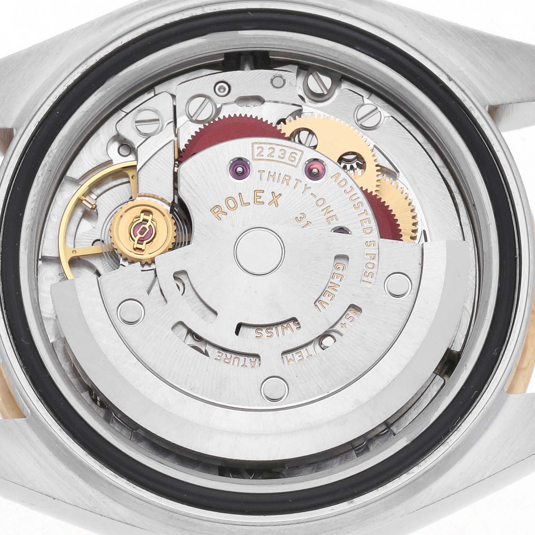 The image shows the internal mechanism of a Rolex Datejust model 279173 men's watch from a back angle, highlighting its intricate components and engravings.