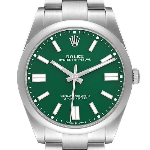 The image shows a front view of the Rolex Oyster Perpetual model 124300 watch, highlighting the green dial, markers, hands, bezel, crown, and part of the bracelet.