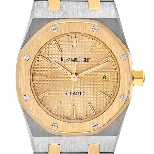 The image shows a front view of the Audemars Piguet Royal Oak 15000SA.OO.0789SA.02 Men's Steel and Gold (two tone) Champagne Dial 15000SA.OO.0789SA.02 Men's Steel and Gold (two tone) Champagne Dial watch, highlighting its gold dial, bezel, and bracelet.