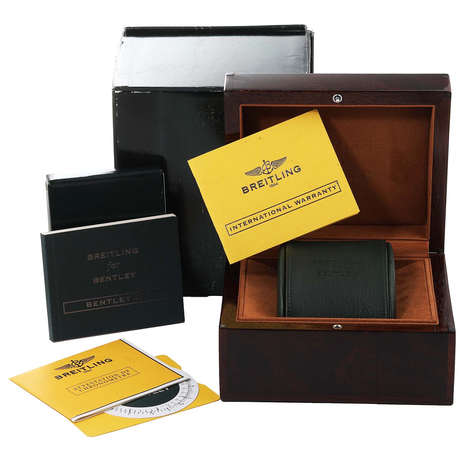 The Bentley model by Breitling is displayed with its box, packaging, manual, warranty card, and accessories.