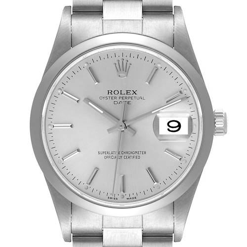 The image shows a front view of a Rolex Oyster Perpetual Date watch, highlighting the dial, hands, date window, and part of the bracelet.